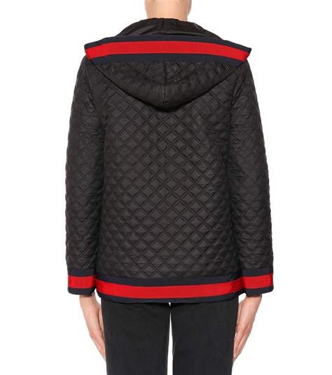 gucci black diamond quilted coat.